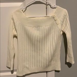Off the shoulder sweater.
